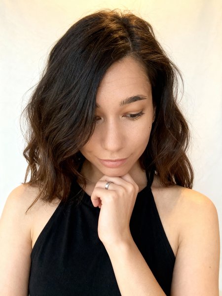 Contemplative dark hair portrait